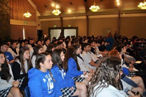 The student body at AGBU Vatche & Tamar Manoukian High School listens earnestly to the heroic endeavors of the Near East Relief in rescuing and rehabilitating Armenian Genocide survivors.
